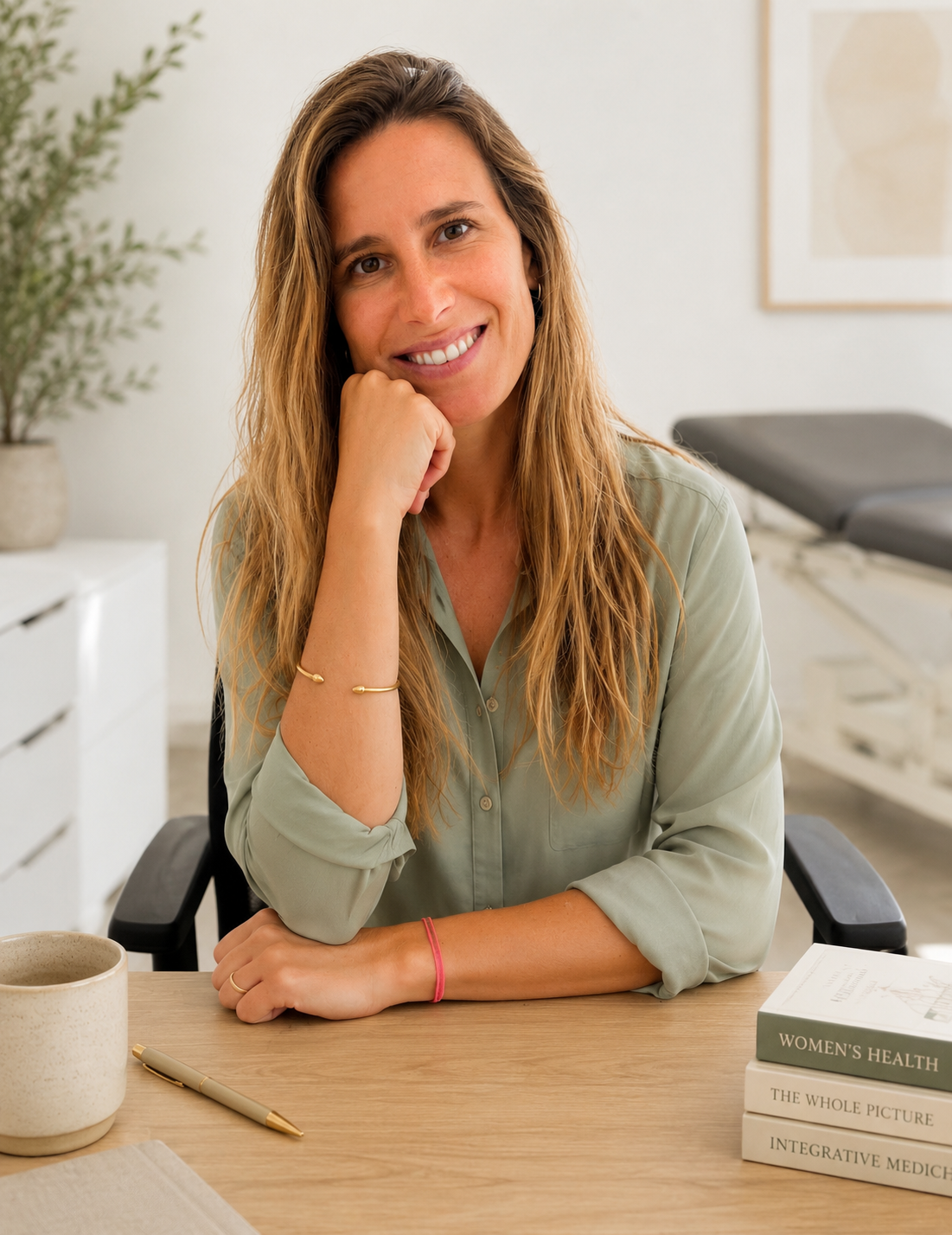 Dr Maria Hatton seated at her consulting desk